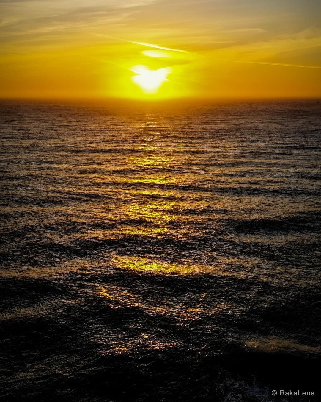 Sunset’s sigh, painting the sky, a masterpiece before the night.